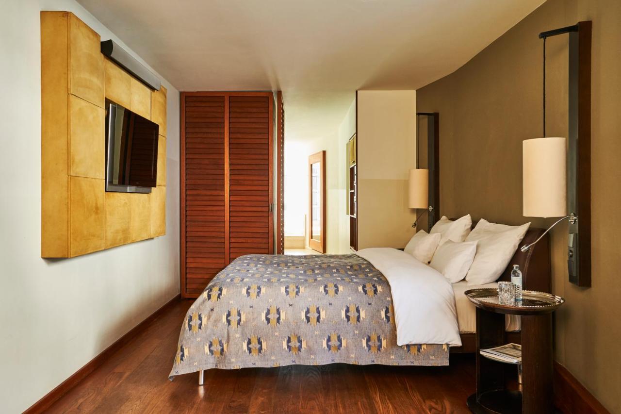 Do&Co Hotel Viyana Dış mekan fotoğraf A bedroom at the Mandarin Oriental, Munich